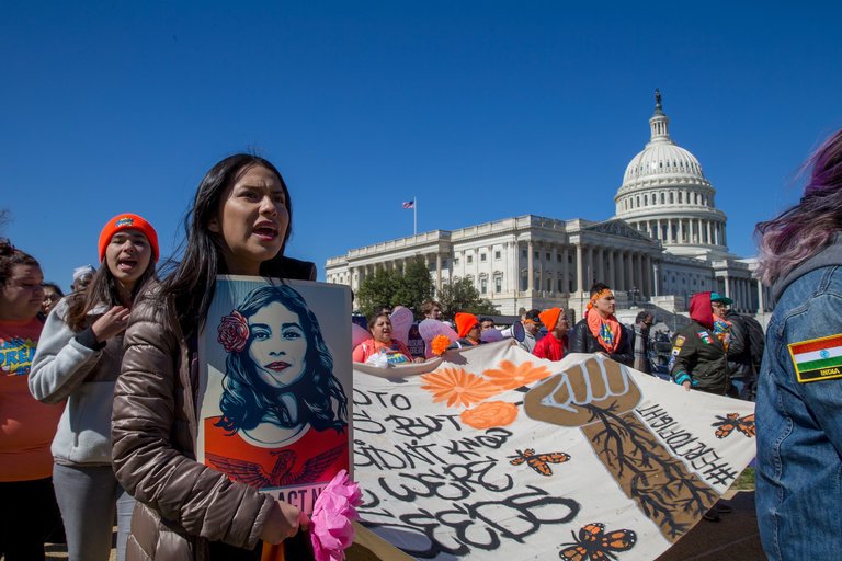 Students protesting the rescission of DACA in front of the U.S. capital.